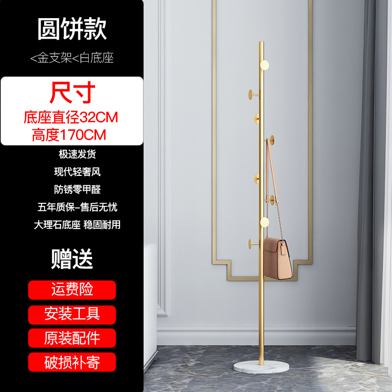 Round disc design, gold stand, white base, marble base.
