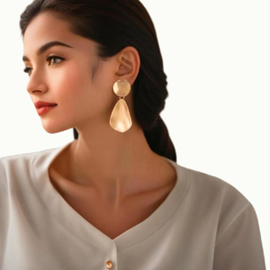 Vintage tasarım pürüzsüz doku su damlası kulak damızlık kadınlar için basit Lady günlük sallanan küpe aksesuarları moda takı hediyeler