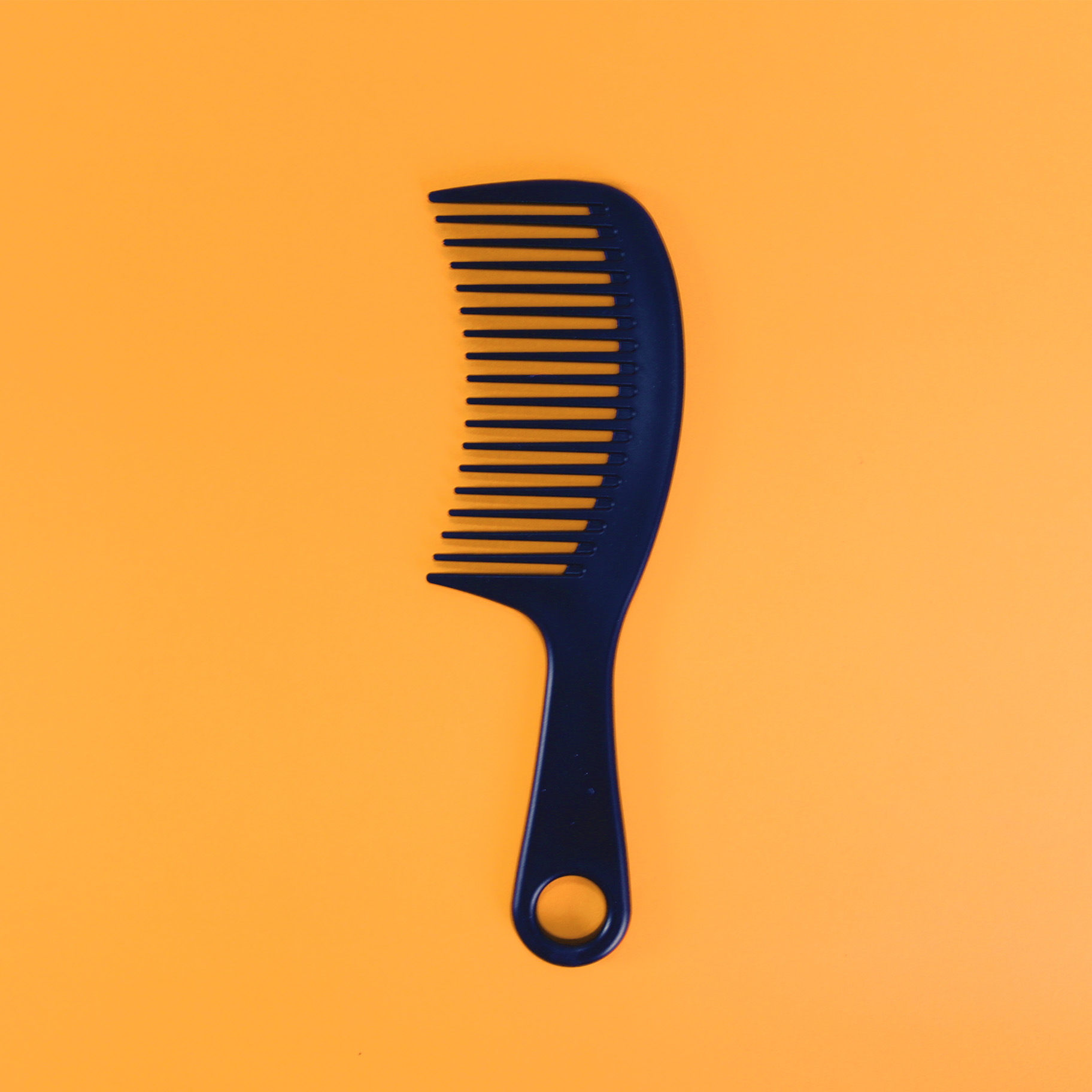 Black-wide-tooth comb
