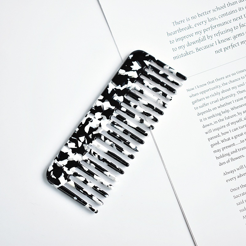 black and white striper acetic acid comb