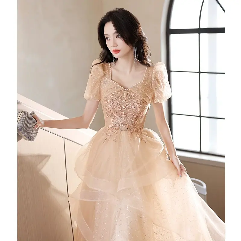 2023 Novo Design High End Banquete Princesa Coming of Age Cerimônia de Manga Curta Fairy Dress Champagne Tulle Vestido De Noite