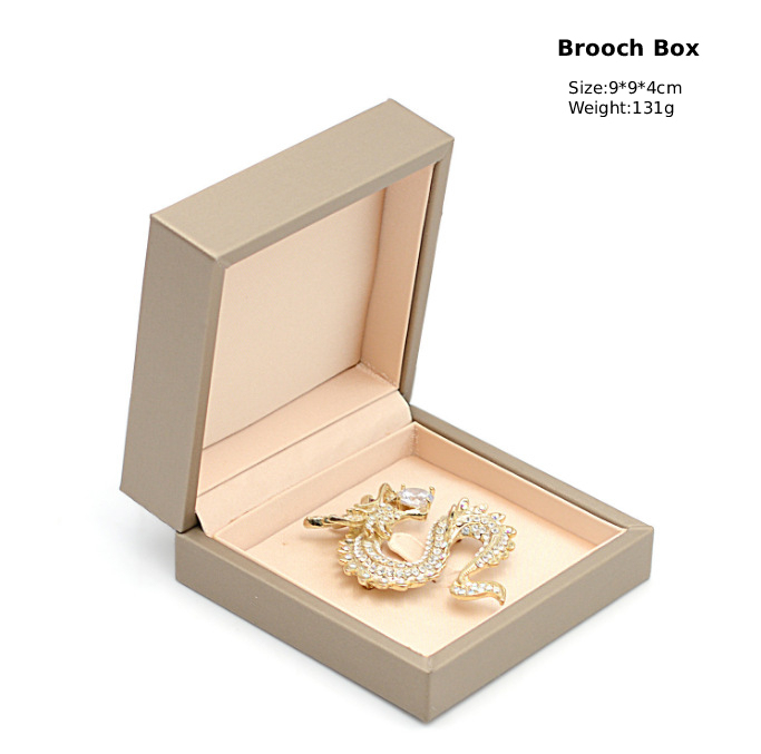 Gold brooch box