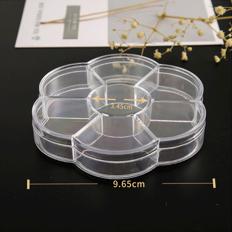 The 7-compartment round shape is not removable.