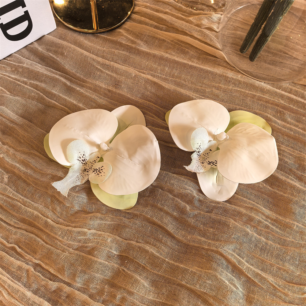 Pair of white phalaenopsis flower shoe clip