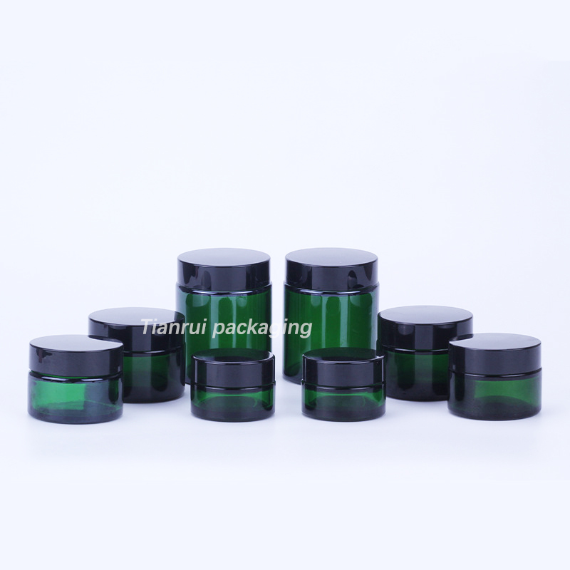 Green bottle with black lid