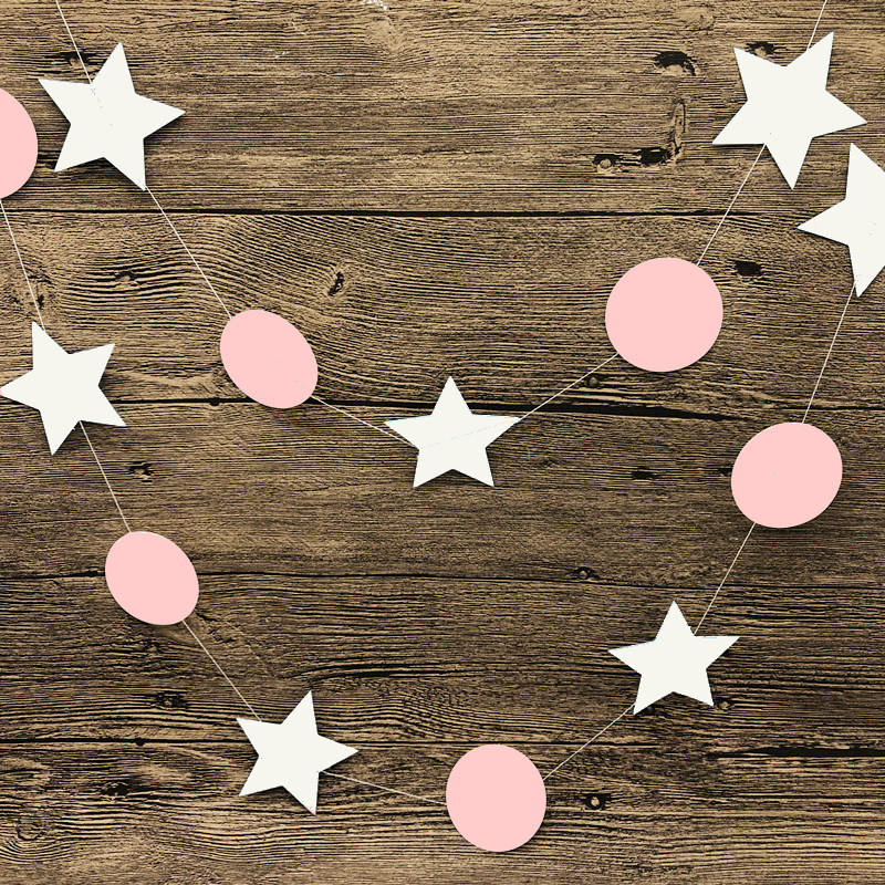 Cercle rose coloré avec un pentagramme blanc.
