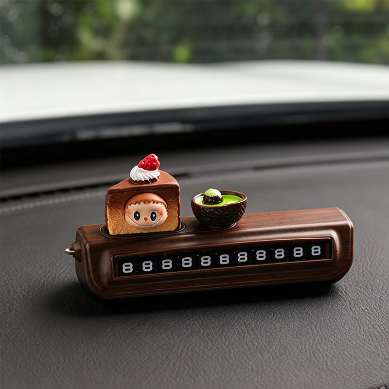 A bowl of strawberry cake and a rolling number plate