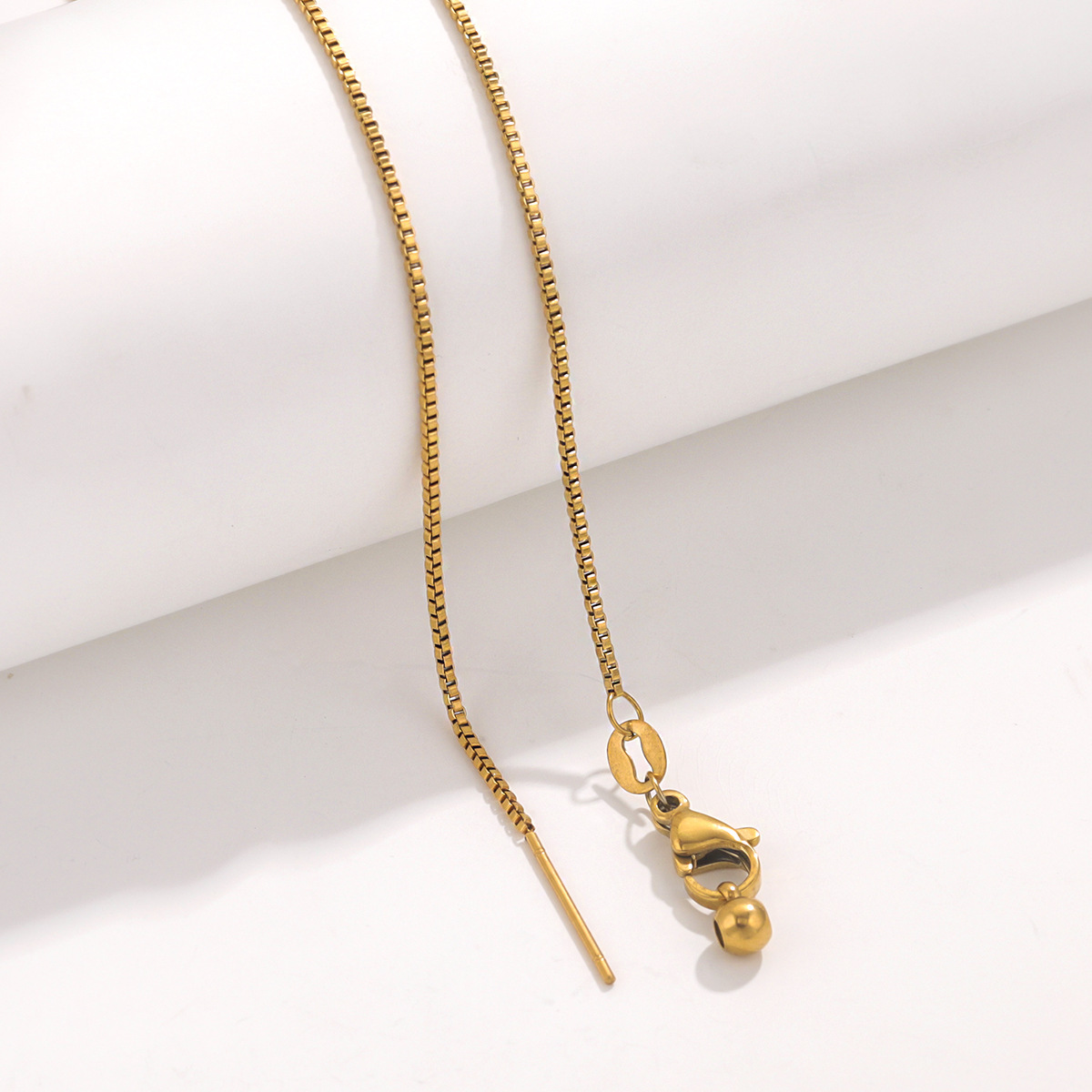 Cadena de caja de oro