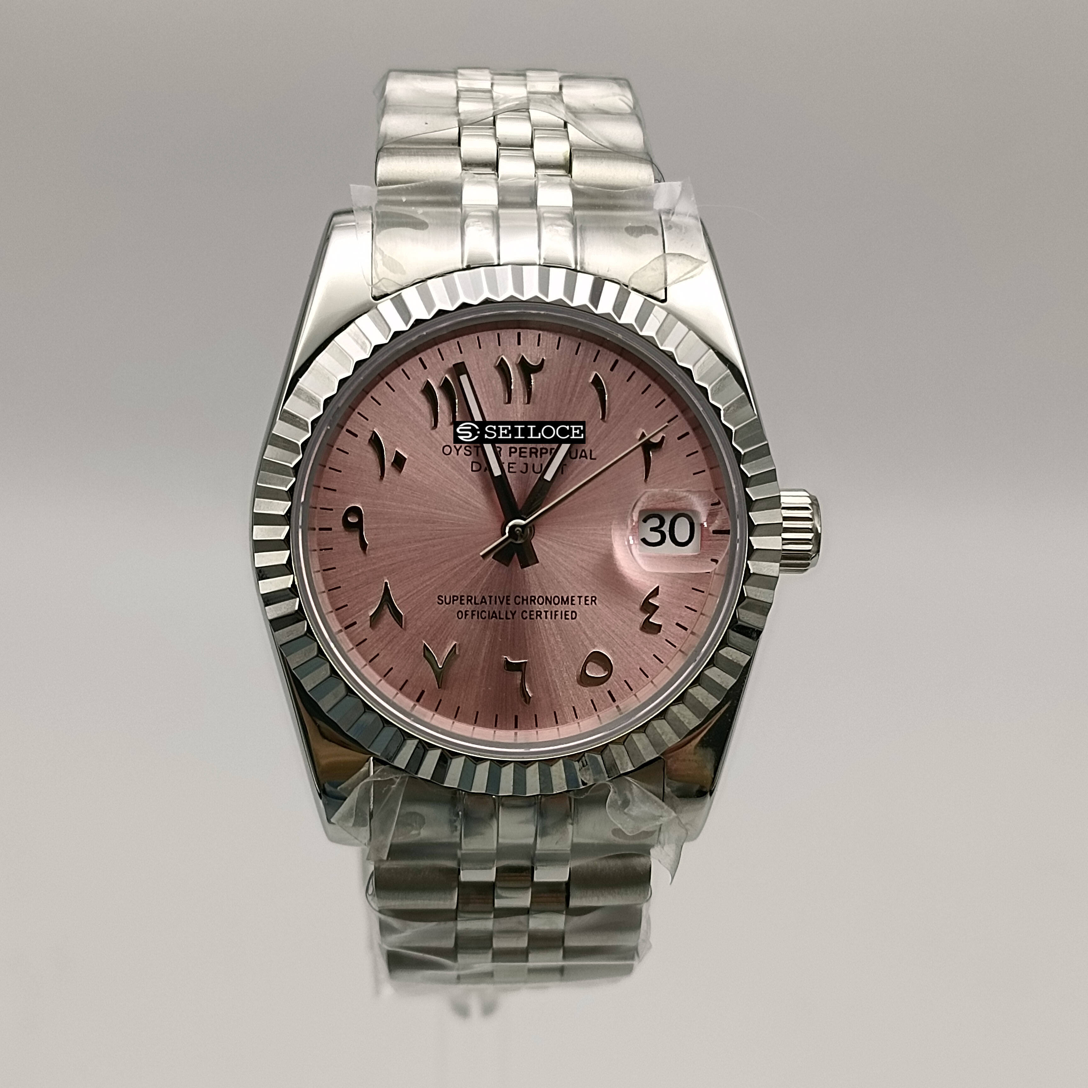 Boîtier argenté + cadran rose