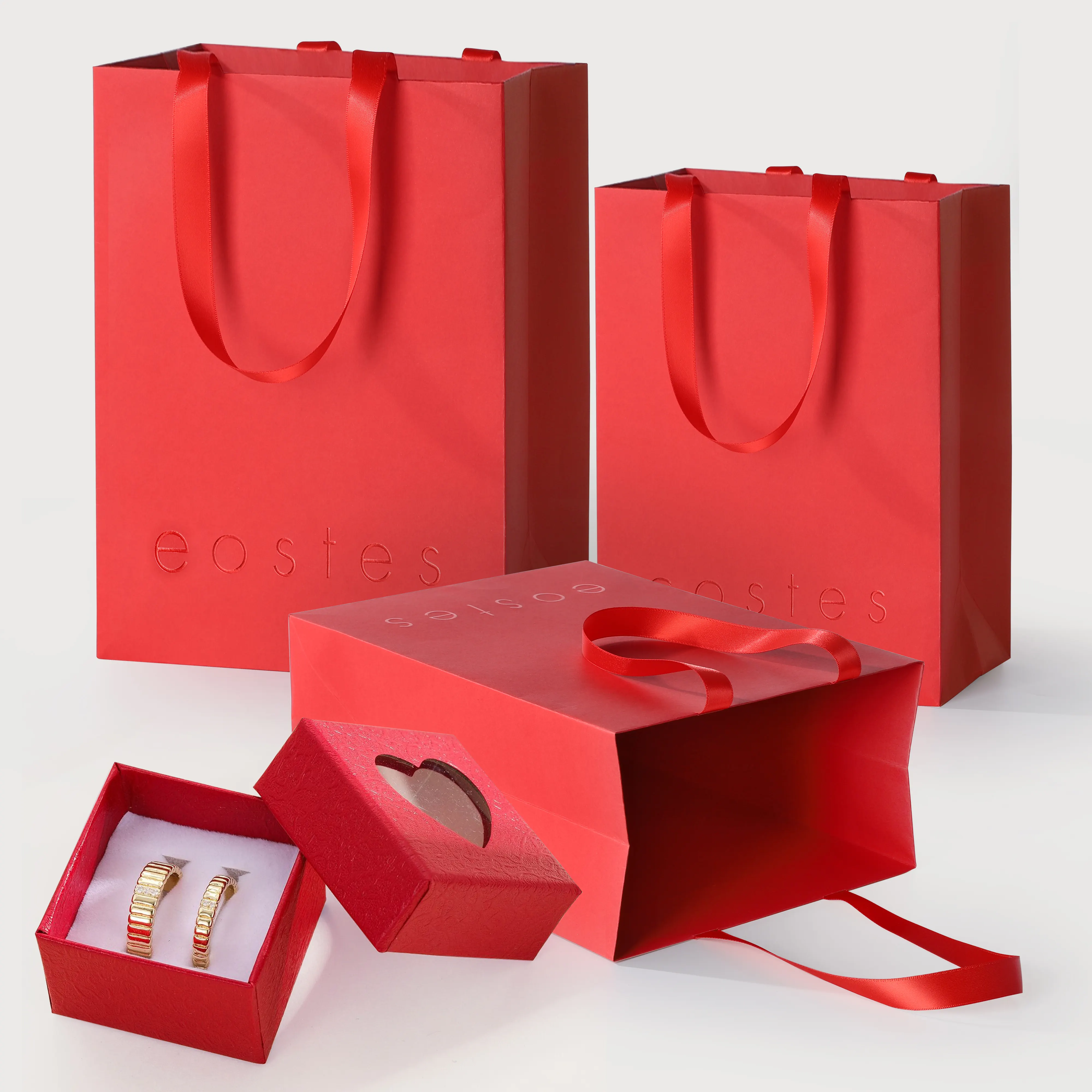 ถุงกระดาษช้อปปิ้งแบบกำหนดเองพร้อมโลโก้ถุงของขวัญถุงกระดาษช้อปปิ้งสุดหรูสีแดงของขวัญแต่งงาน