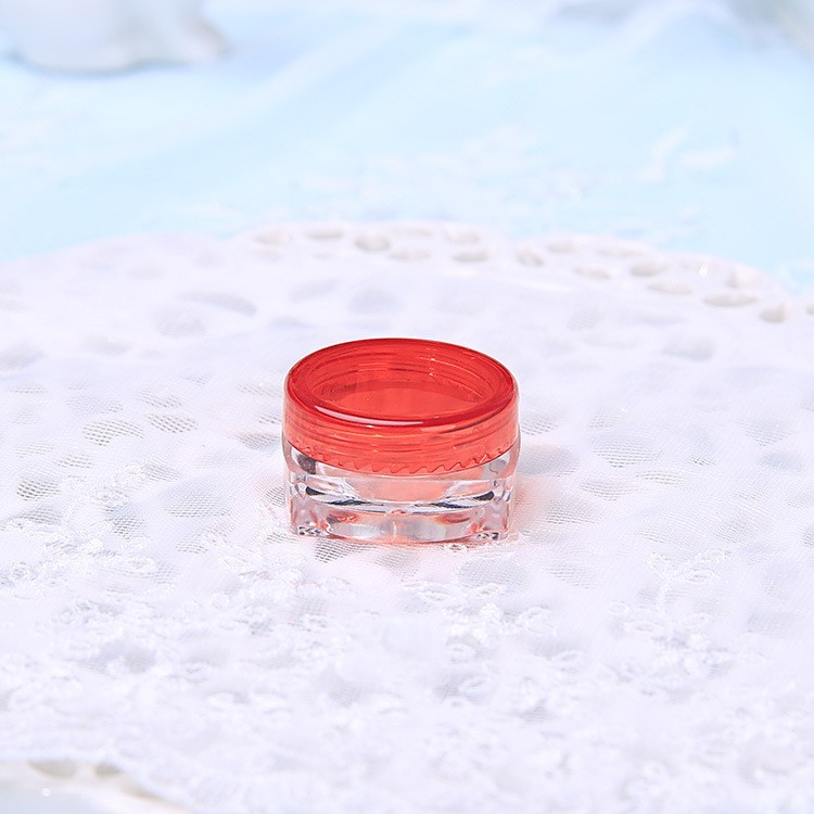 Pot carré transparent + bouchon à vis rouge