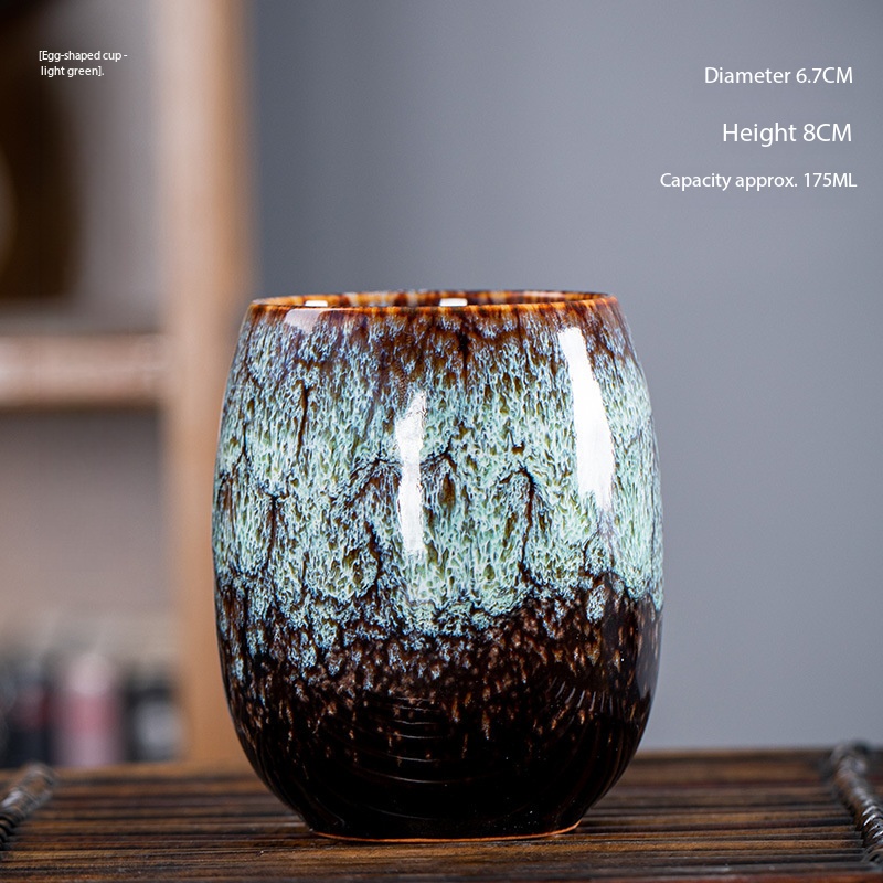 Taza en forma de huevo verde