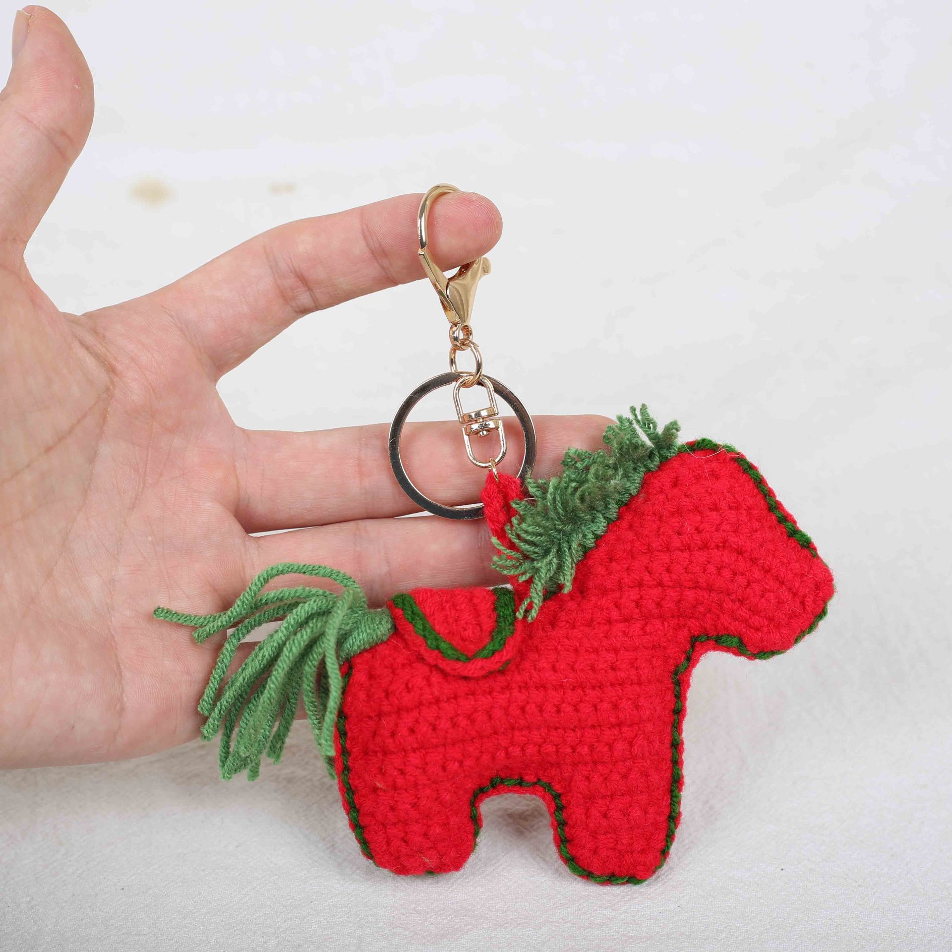 Boucle cheval rouge-or