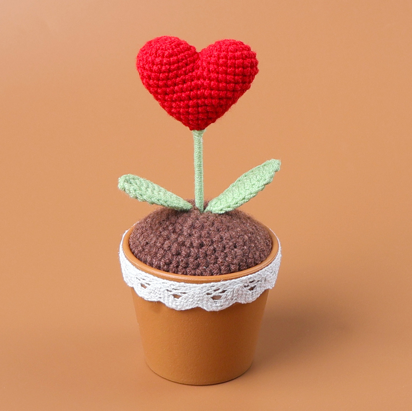 Plante en pot d'amour rouge