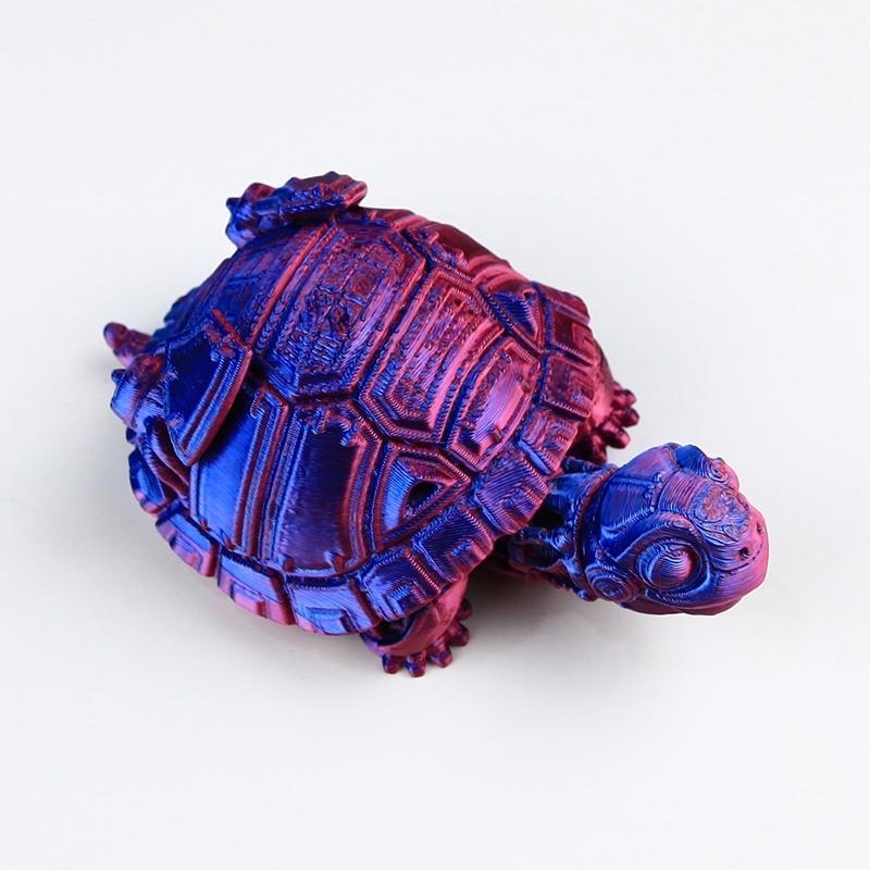 Tortue mécanique rouge et bleue 10cm