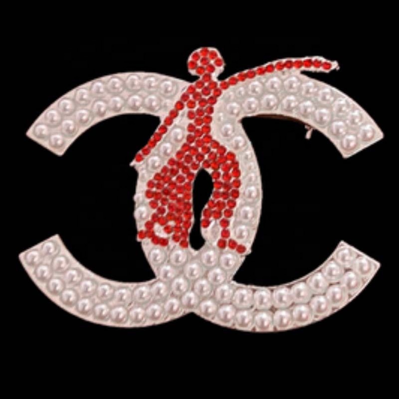 épingle de dame rouge