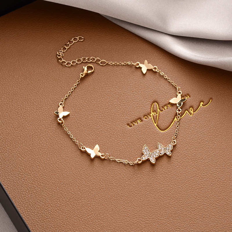 2067# Bracelet papillon doré