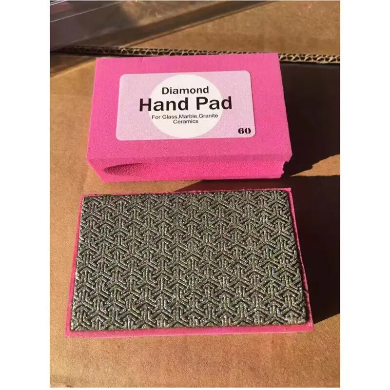 Electroplated hand polishing pads