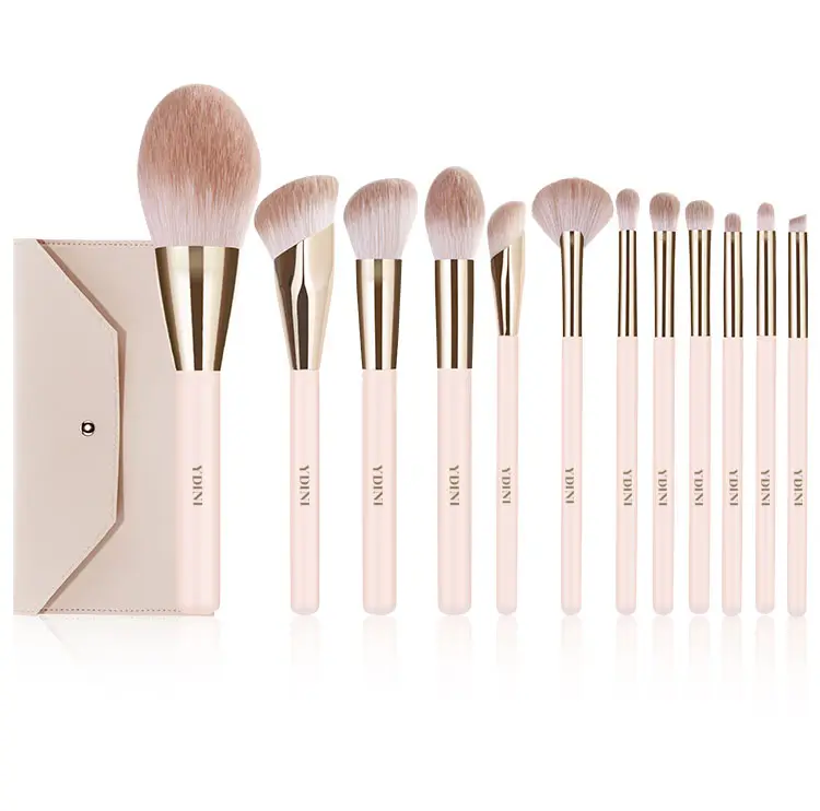 Vendita all'ingrosso di YDINI 12 pezzi Beige manico in legno cosmetico Make Up Brush Kit Private Label Set di pennelli per il trucco con borsa