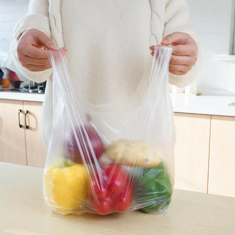 Pabrik cetak kustom penjualan langsung bening transparan kualitas makanan plastik ldpe makanan rompi kemasan tas dalam gulungan