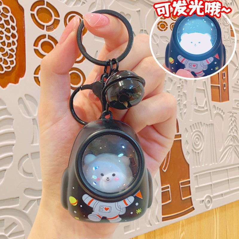 Black glowing backpack with bell