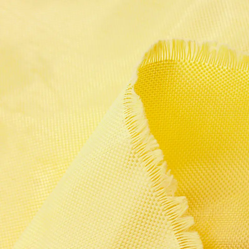 1500D tejido ignífugo sarga liso Kevlars Para aramida tela protectora balística para casco industria amarillo recubierto 100gsm