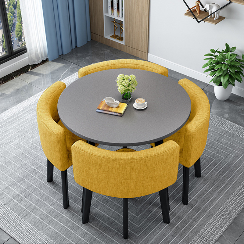 Gray round table + yellow fabric chairs