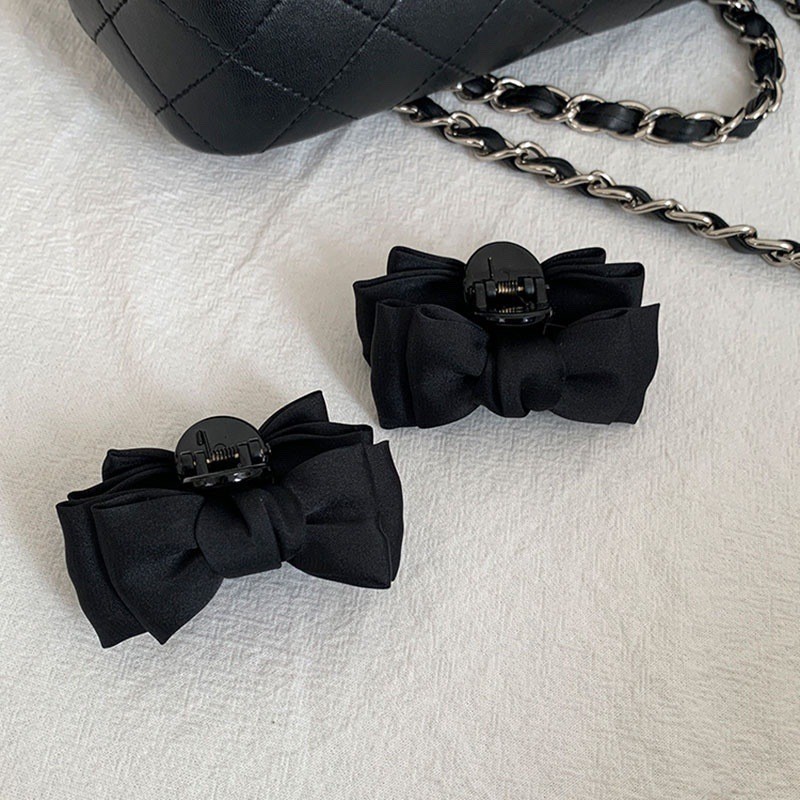 11 black small bows