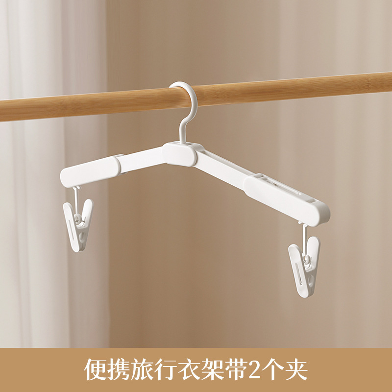 1 clothes hanger with 2 clips