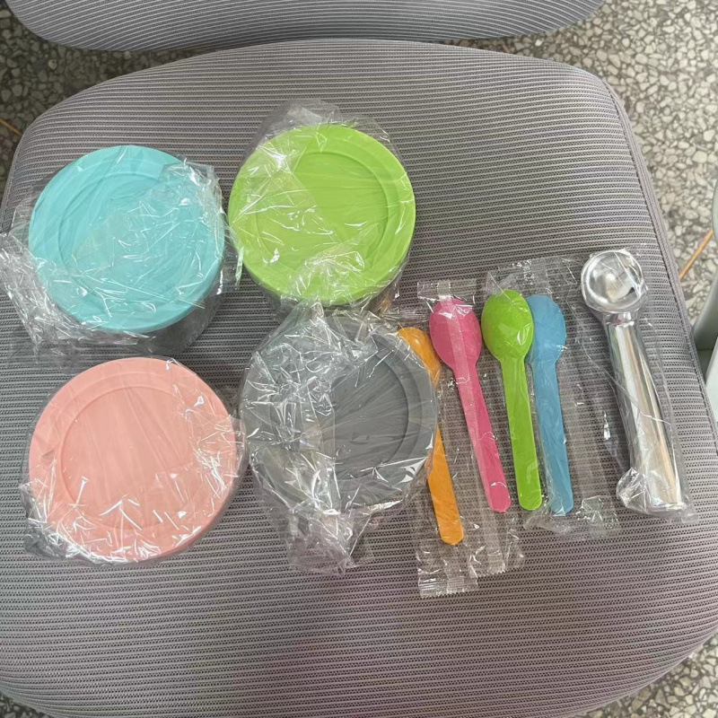 Four jars and four plastic spoons/scoops