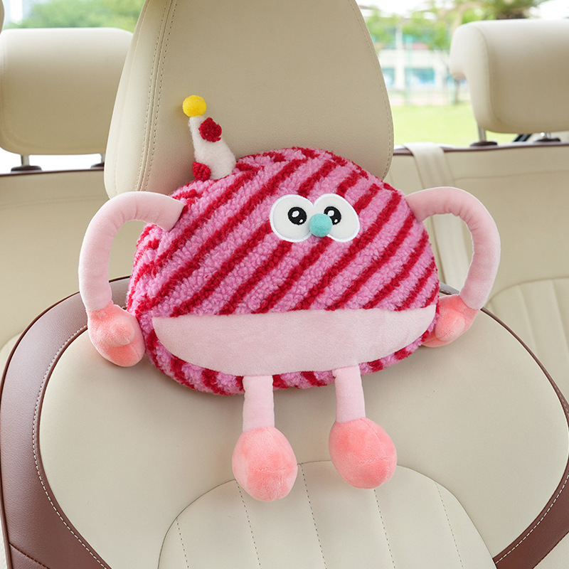 Appui-tête monstre en peluche rouge rayé