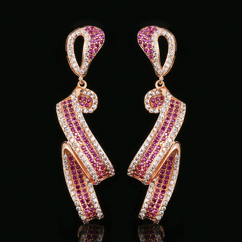 Boucles d'oreilles puces en corindon rouge or rose