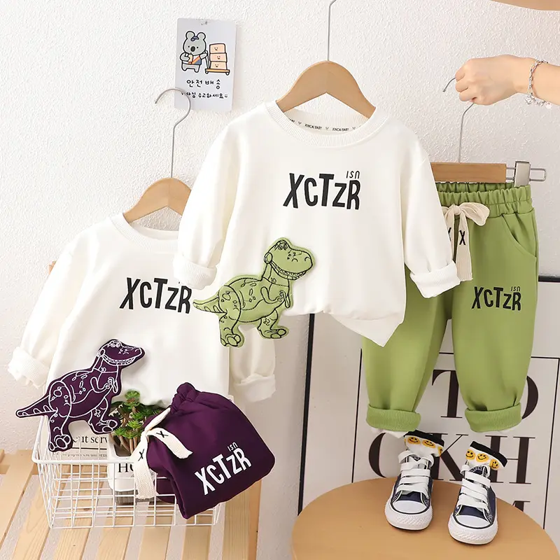 Conjunto de suéter de primavera y otoño para niños Conjunto de manga larga de suéter de dinosaurio con etiqueta para niños nuevos