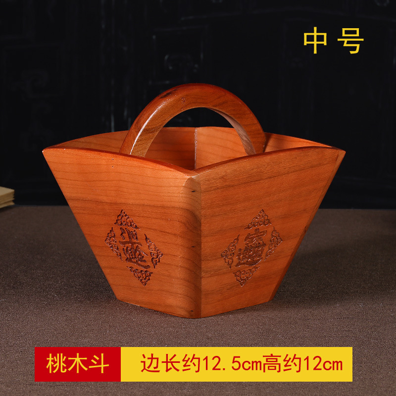Medium-sized peach wood bowl, approximately 12.5 x 10 cm.