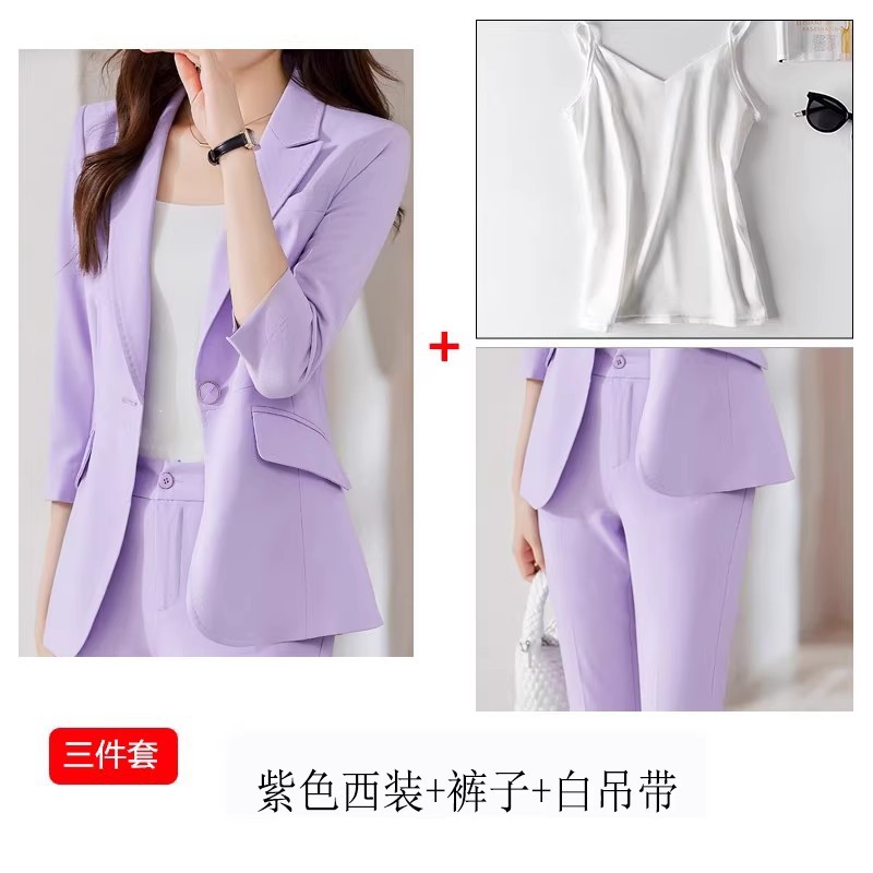 Purple suit with white suspender pants