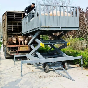 Piattaforma di sollevamento a forbice fissa e Mobile, carico di sollevamento dell'elevatore di merci 2T 3T 4T per il trasporto di suini, bovini e ovini - Product Image 1