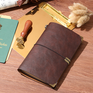 A6Retro โน้ตบุ๊คหนัง PU นุ่มไดอารี่สมุดบันทึกการเดินทางสมุดบันทึกการออกแบบลายนูนโลโก้ - Product Image 4