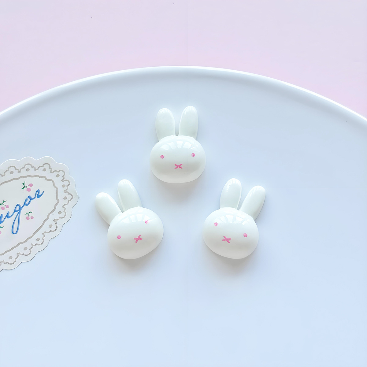 Petite tête de lapin à bouche poudrée, 23*17mm
