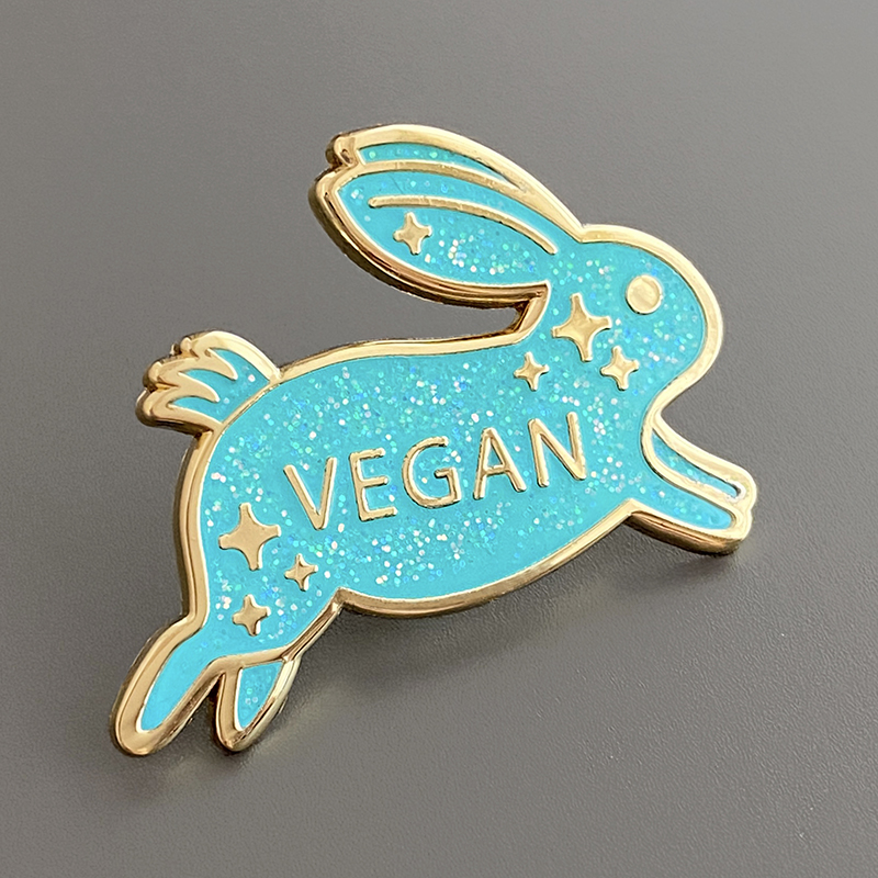Pin's émaillé à paillettes