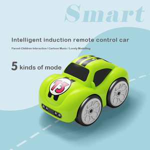 Cross-border Cartoon Remote <strong>Control</strong> Follow Car 2.4G Magic Hand <strong>Control</strong> Obstacle Avoidance Tractor Music Wholesale Kids Toys