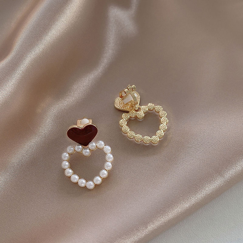 27-Love pearl ear clips