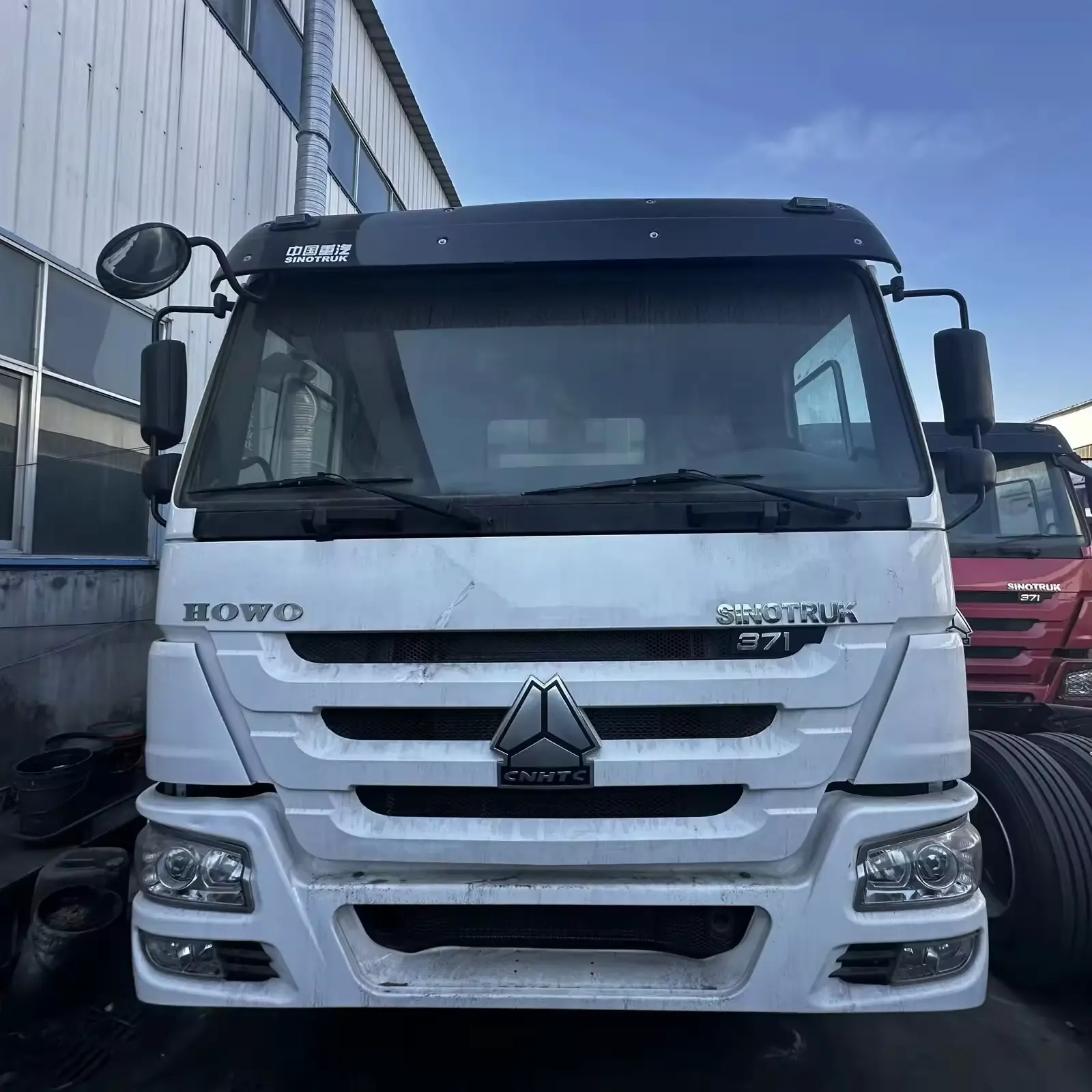 Sinotruk HOWO blanco 8*4 camión volquete de doce ruedas camión de segunda mano de alta calidad 371HP