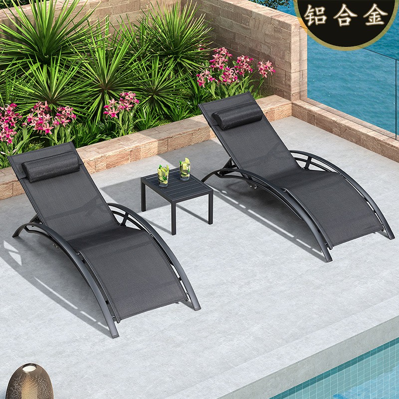 2 black lounge chairs+1 matching coffee table