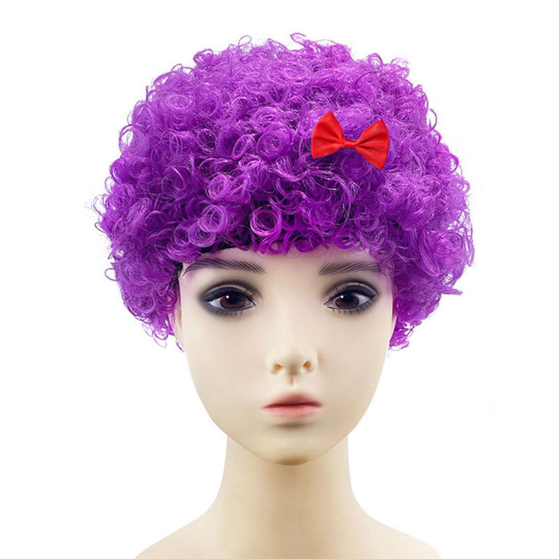 Fans wear deep purple afro-bowknot