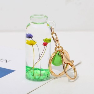 Chaveiro flutuante em forma de garrafa de plástico transparente personalizado, chaveiro com óleo e glitter fofo para meninas, embalagem de presente incluída