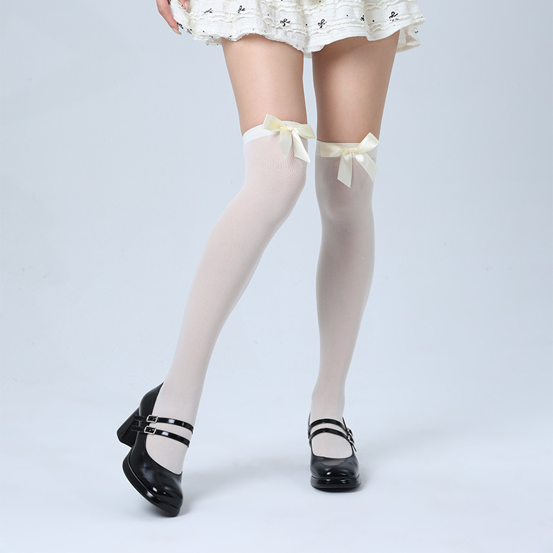 Yellow bow and white silk