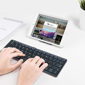 Teclado plegable dual ultra delgado Teclado dual Teclado de viaje de múltiples canales Bluetooth para iOS, Android, dispositivo Windows
