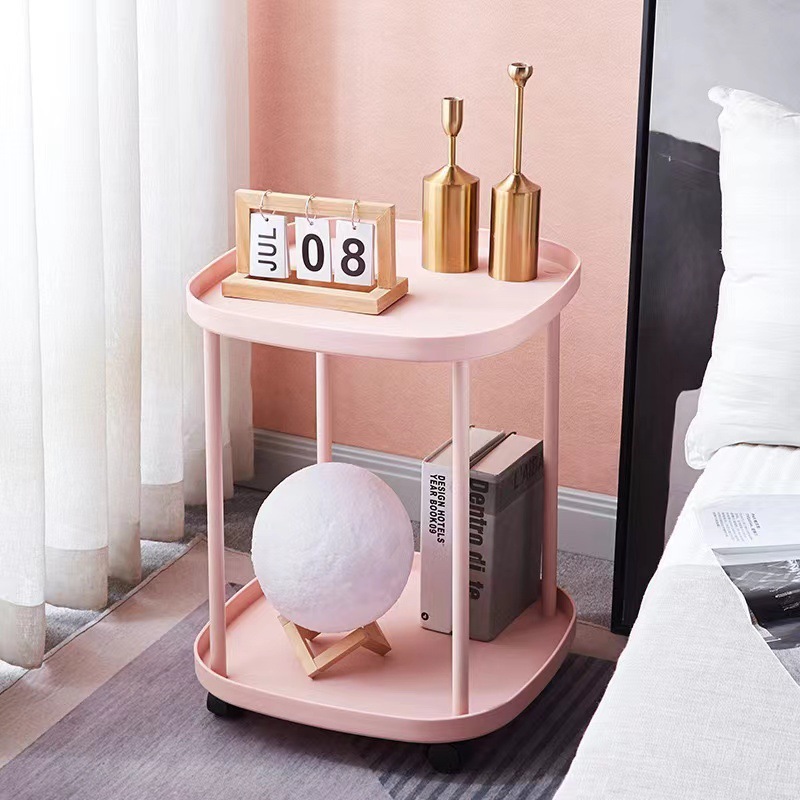 Table basse en plastique rose