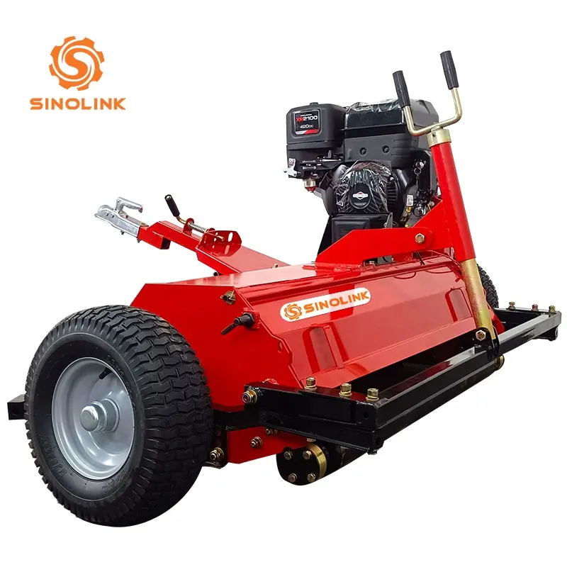 A small mechanical ATV lawn mower used for trimming lawn vegetation