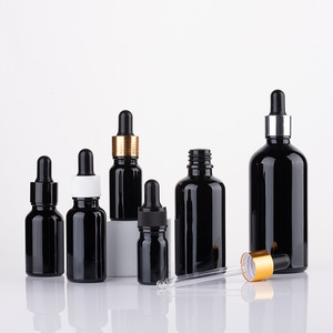 Venta al por mayor vacío 5ml 10ml 15ml 20ml 30ml 50ml 100ml Cuidado de la piel esencia botella de aceite esencial de vidrio negro con cuentagotas - Product Image 1
